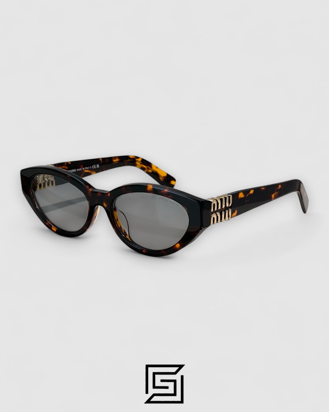 ⁦Miu Miu MUA04 21C40 Light Grey Lenses and Tiger Brown Frame With Gold Logo⁩ - الصورة ⁦1⁩