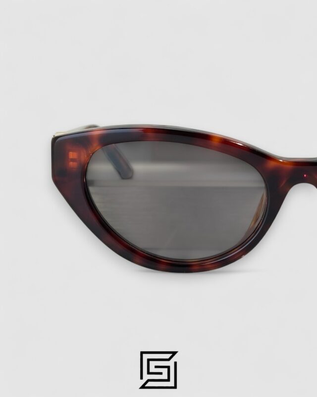 Miu Miu MUA04 21C40 Light Grey Lenses and Tiger Brown Frame With Gold Logo