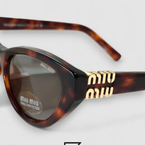 ⁦Miu Miu MUA04 21C40 Light Grey Lenses and Tiger Brown Frame With Gold Logo⁩ - الصورة ⁦4⁩