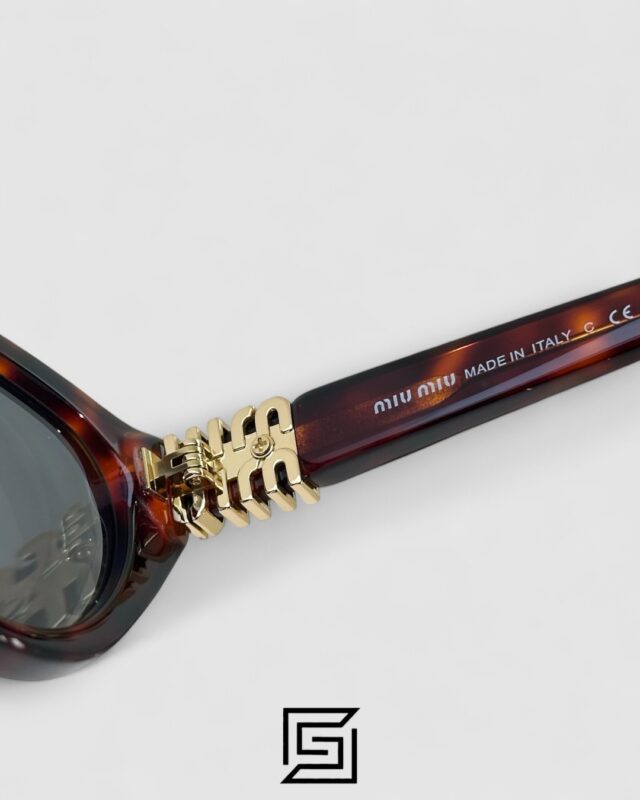 Miu Miu MUA04 21C40 Light Grey Lenses and Tiger Brown Frame With Gold Logo