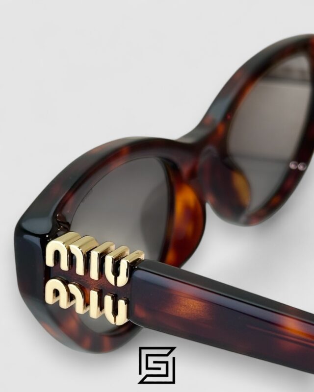Miu Miu MUA04 21C40 Light Grey Lenses and Tiger Brown Frame With Gold Logo