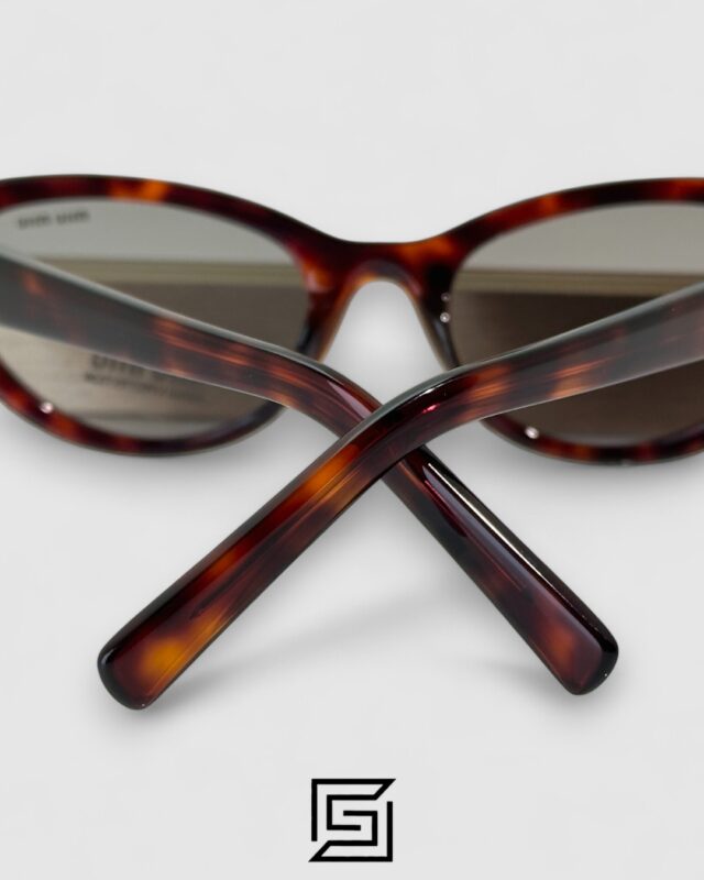 Miu Miu MUA04 21C40 Light Grey Lenses and Tiger Brown Frame With Gold Logo