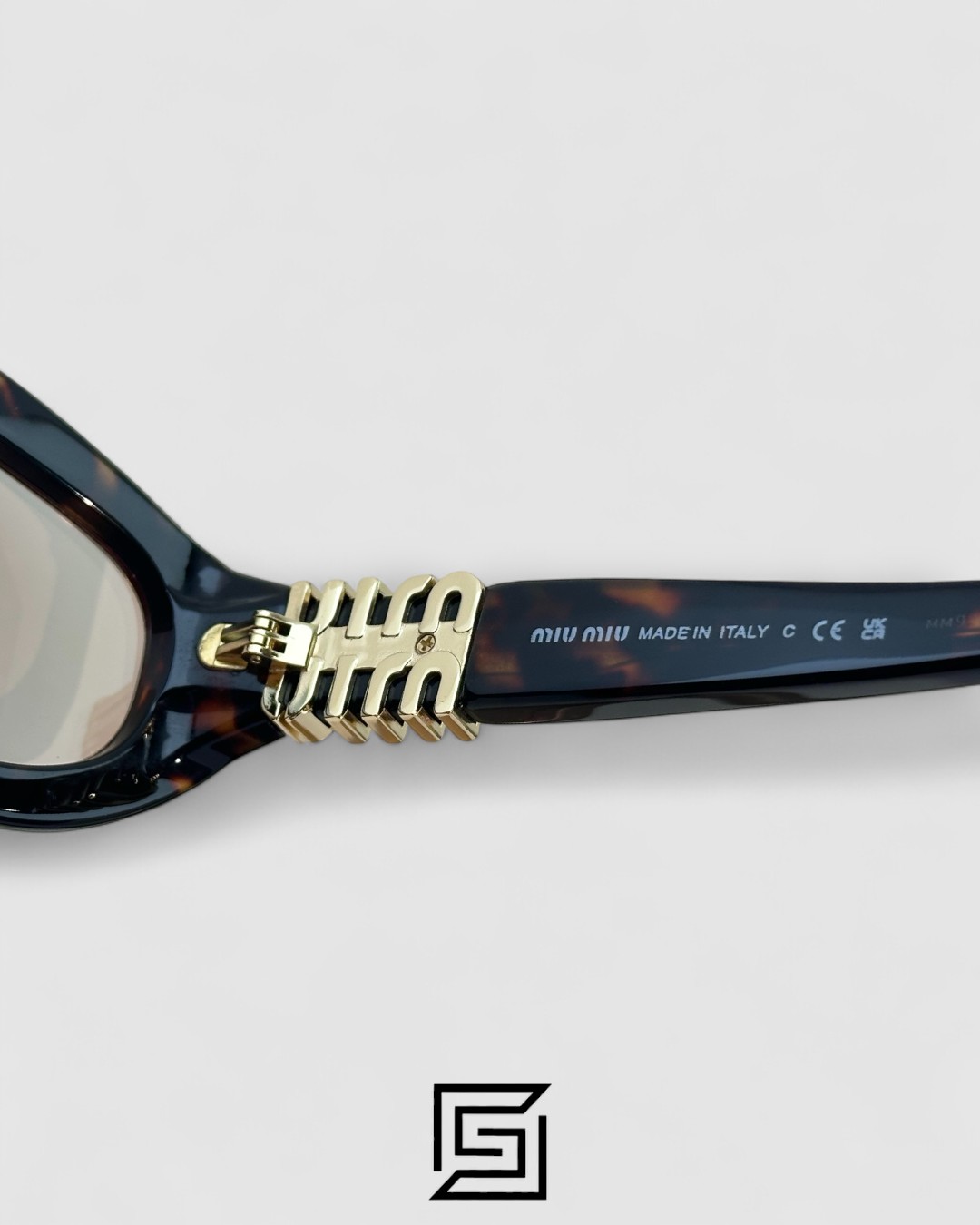 ⁦Miu Miu MU14 141-90H Light Brown Lenses and Tiger Brown Frame With Gold Logo⁩ - الصورة ⁦9⁩