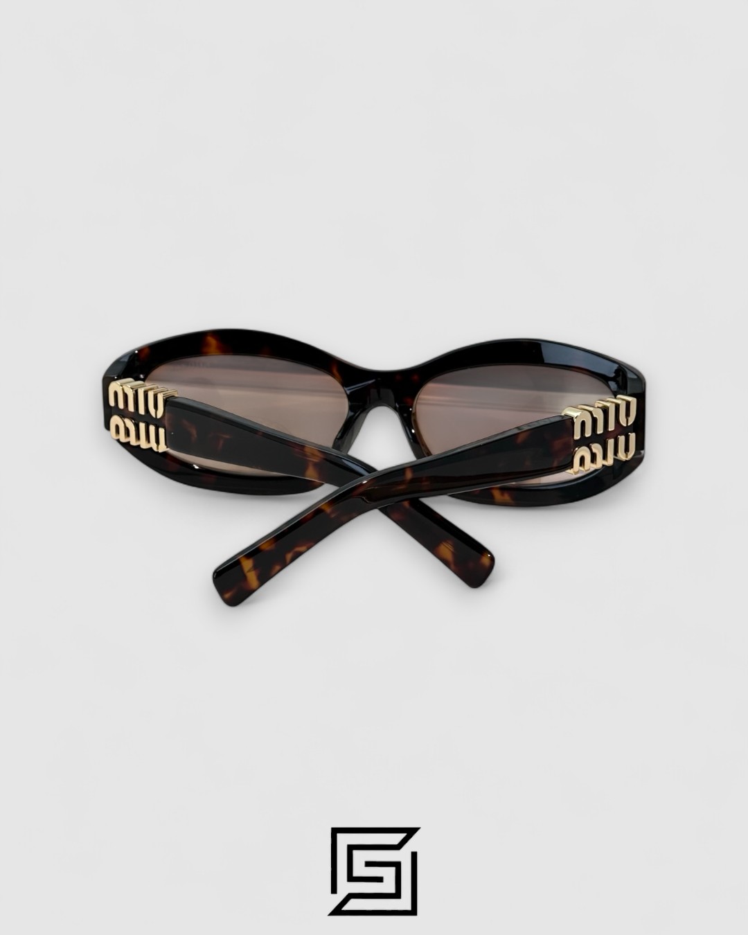 ⁦Miu Miu MU14 141-90H Light Brown Lenses and Tiger Brown Frame With Gold Logo⁩ - الصورة ⁦3⁩