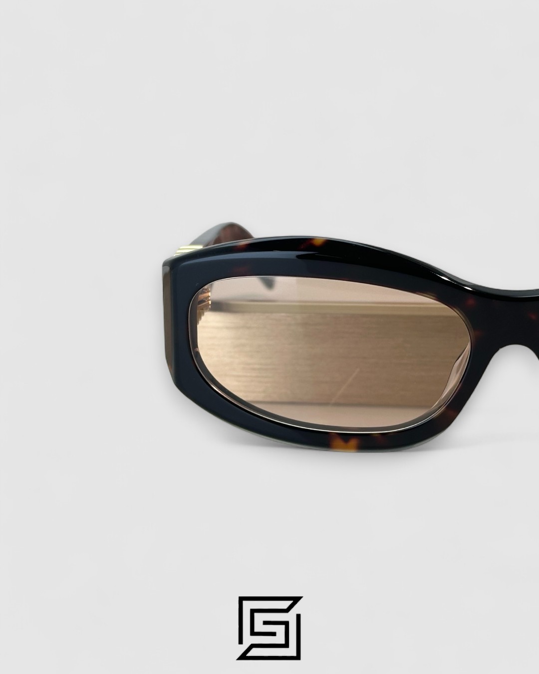 ⁦Miu Miu MU14 141-90H Light Brown Lenses and Tiger Brown Frame With Gold Logo⁩ - الصورة ⁦4⁩