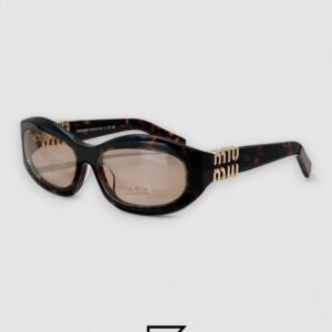 ⁦Miu Miu MU14 141-90H Light Brown Lenses and Tiger Brown Frame With Gold Logo⁩ - الصورة ⁦1⁩