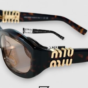 ⁦Miu Miu MU14 141-90H Light Brown Lenses and Tiger Brown Frame With Gold Logo⁩ - الصورة ⁦8⁩