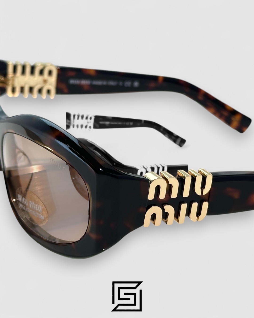 ⁦Miu Miu MU14 141-90H Light Brown Lenses and Tiger Brown Frame With Gold Logo⁩ - الصورة ⁦8⁩