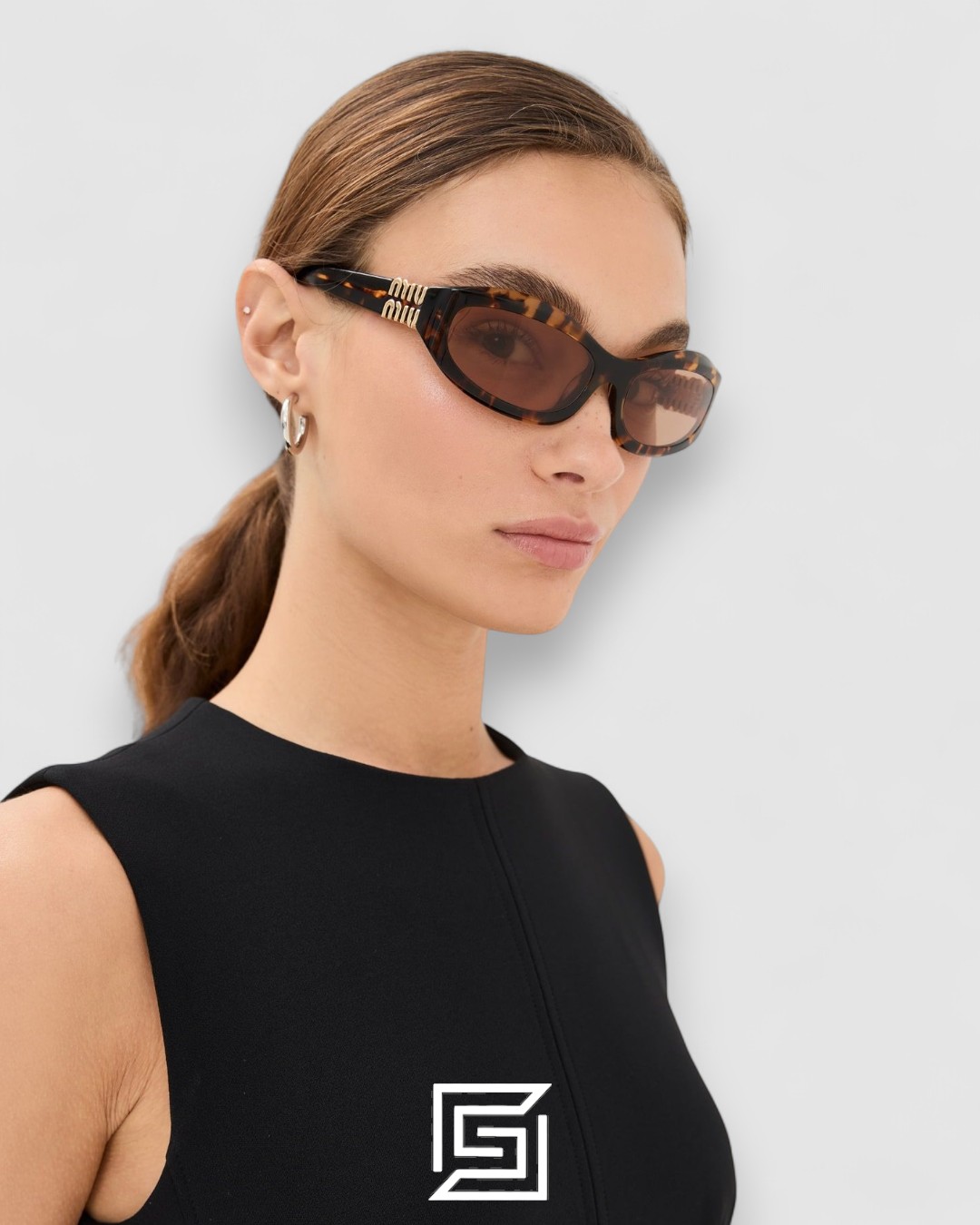 ⁦Miu Miu MU14 141-90H Light Brown Lenses and Tiger Brown Frame With Gold Logo⁩ - الصورة ⁦10⁩