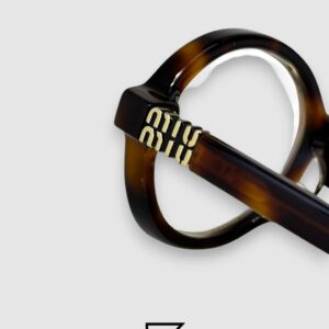 ⁦Miu Miu SMU04Z Tiger Brown Frame Gold LogoOptical Glasses⁩ - الصورة ⁦6⁩