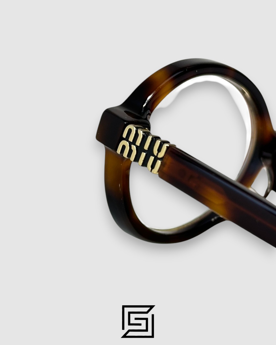 ⁦Miu Miu SMU04Z Tiger Brown Frame Gold LogoOptical Glasses⁩ - الصورة ⁦6⁩