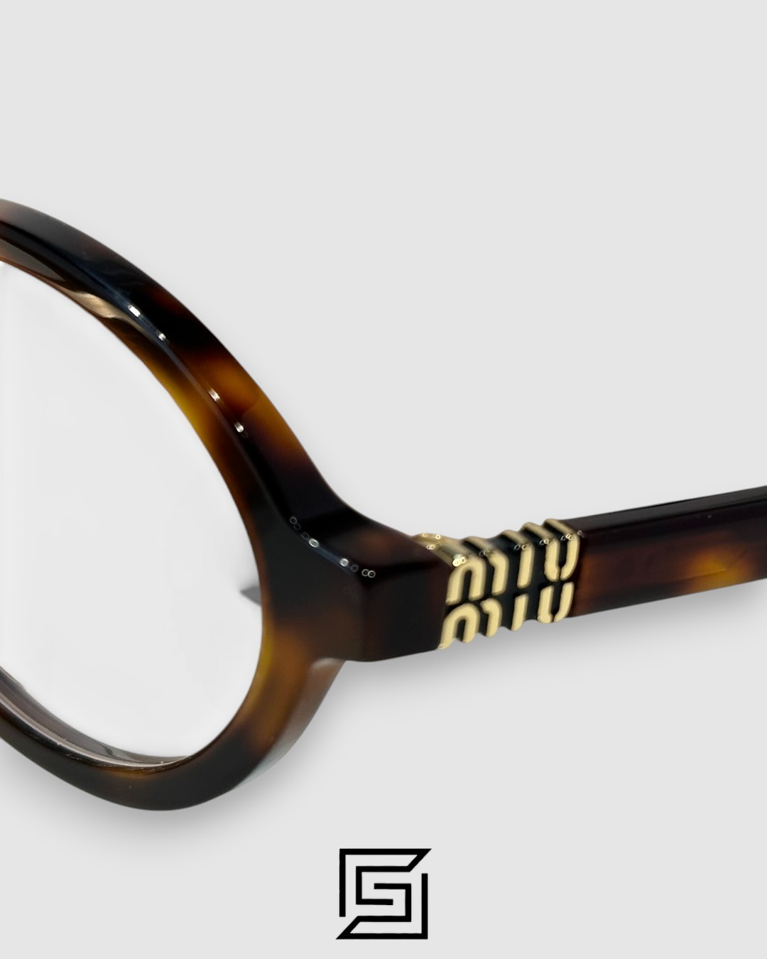 ⁦Miu Miu SMU04Z Tiger Brown Frame Gold LogoOptical Glasses⁩ - الصورة ⁦5⁩